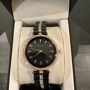Anne Klein Women’s Black and Gold Watch